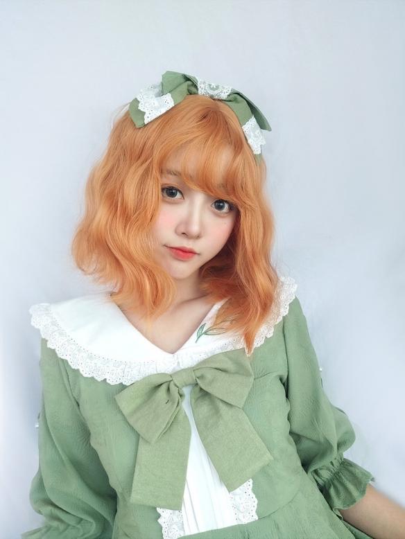 LIVING CORAL WAVY SYNTHETIC WEFTED CAP WIG LG104