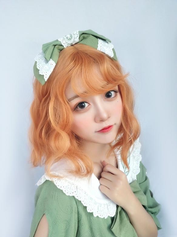 LIVING CORAL WAVY SYNTHETIC WEFTED CAP WIG LG104